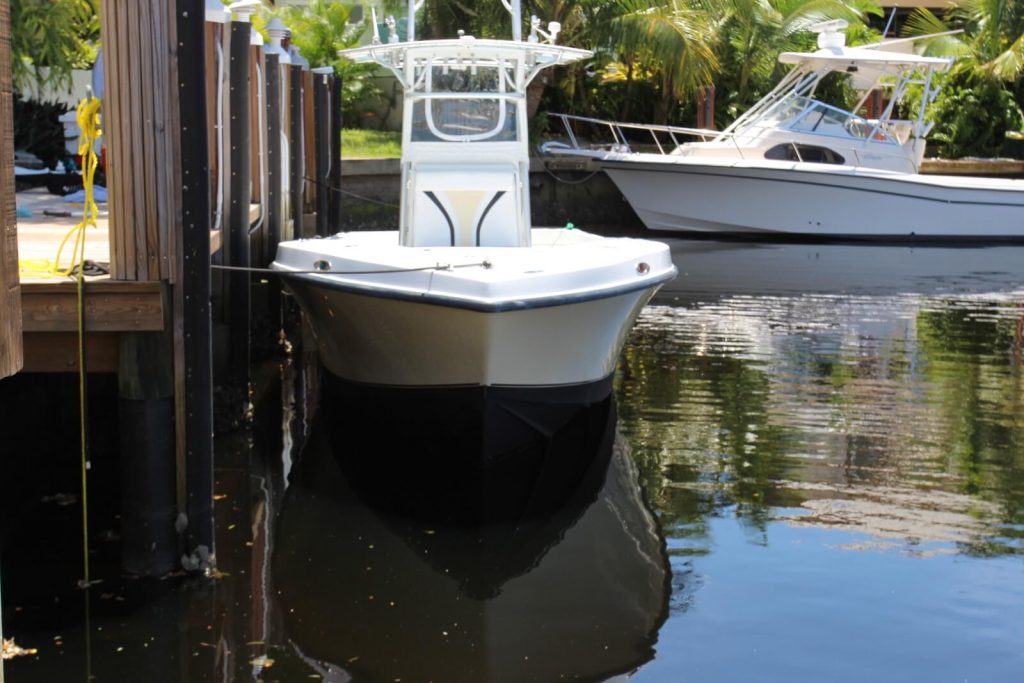 SeaVee boat sitting in the water docked