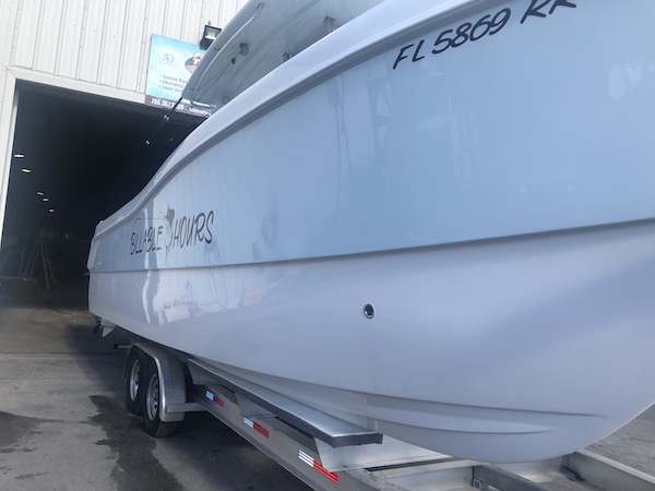 Starboard of 31' Prowler sitting on a trailer at the manufacturers facility