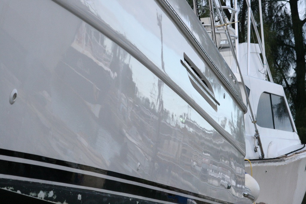 Reflection of white hull on 52' Princess