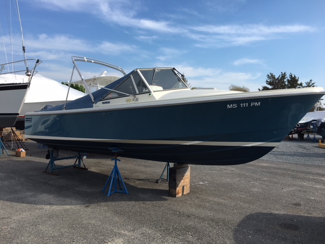 Starboard of 24' Limestone boat sitting in the yard after restore tired gel coat using ceramic coating