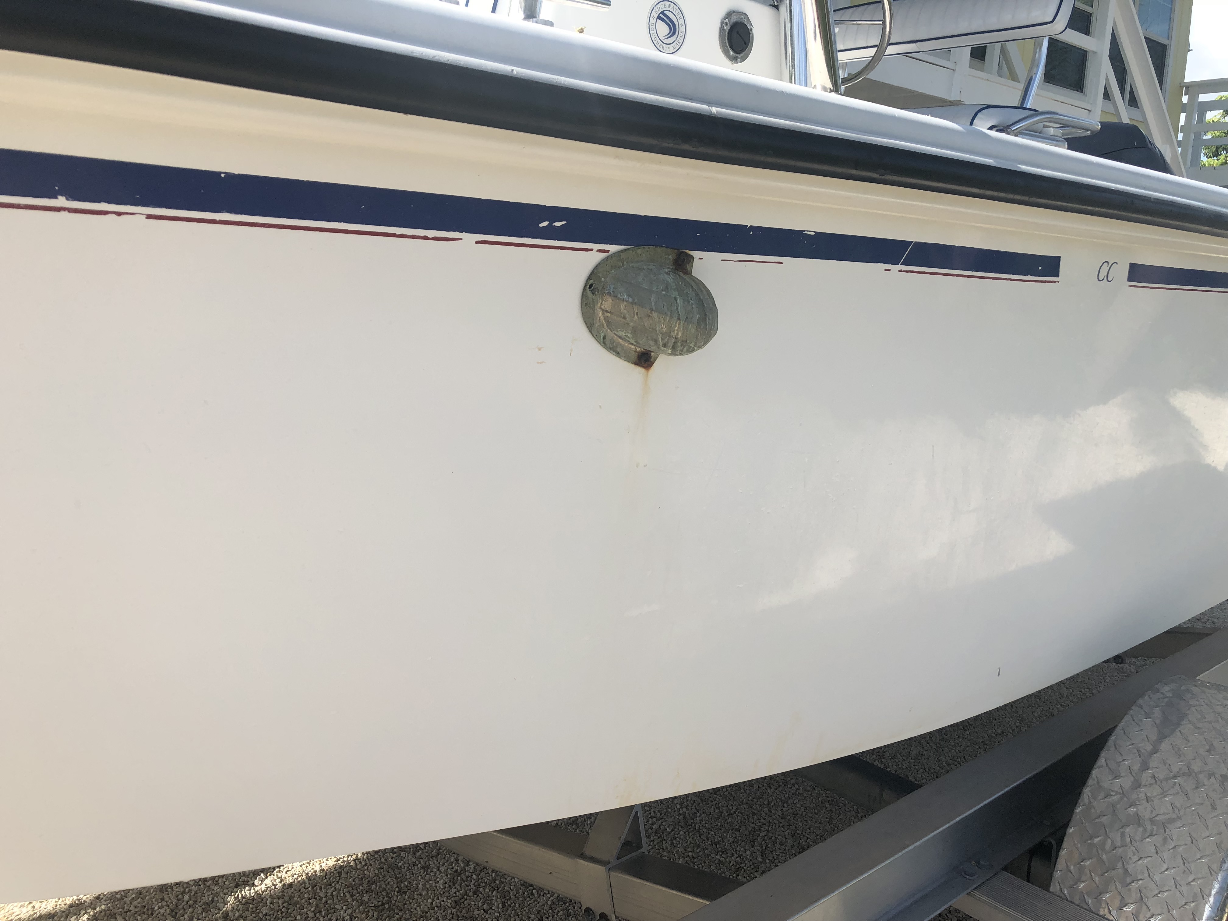 Stains on the hull of Edgewater boat before detailing