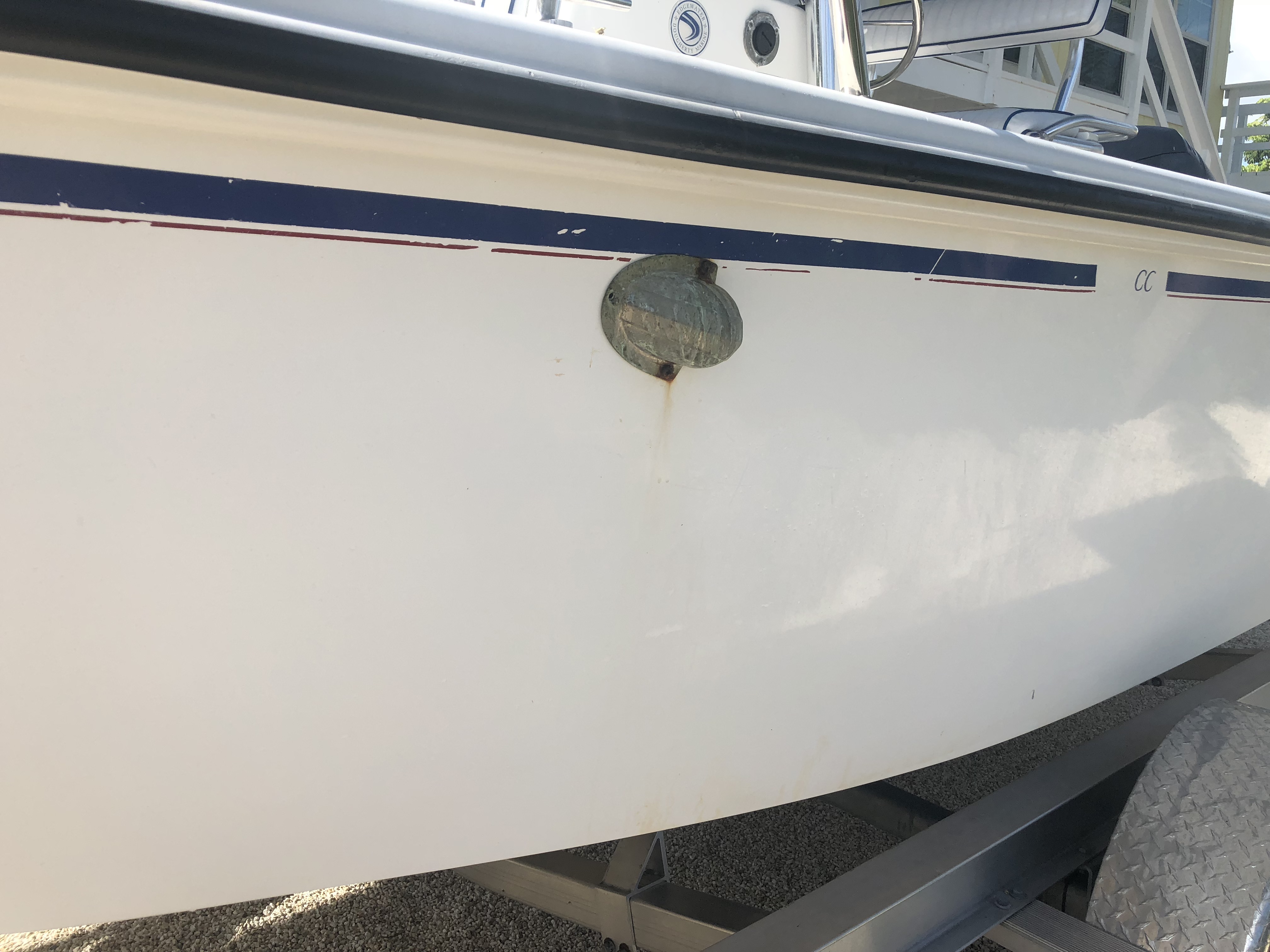 Stains on the hull of Edgewater boat before detailing
