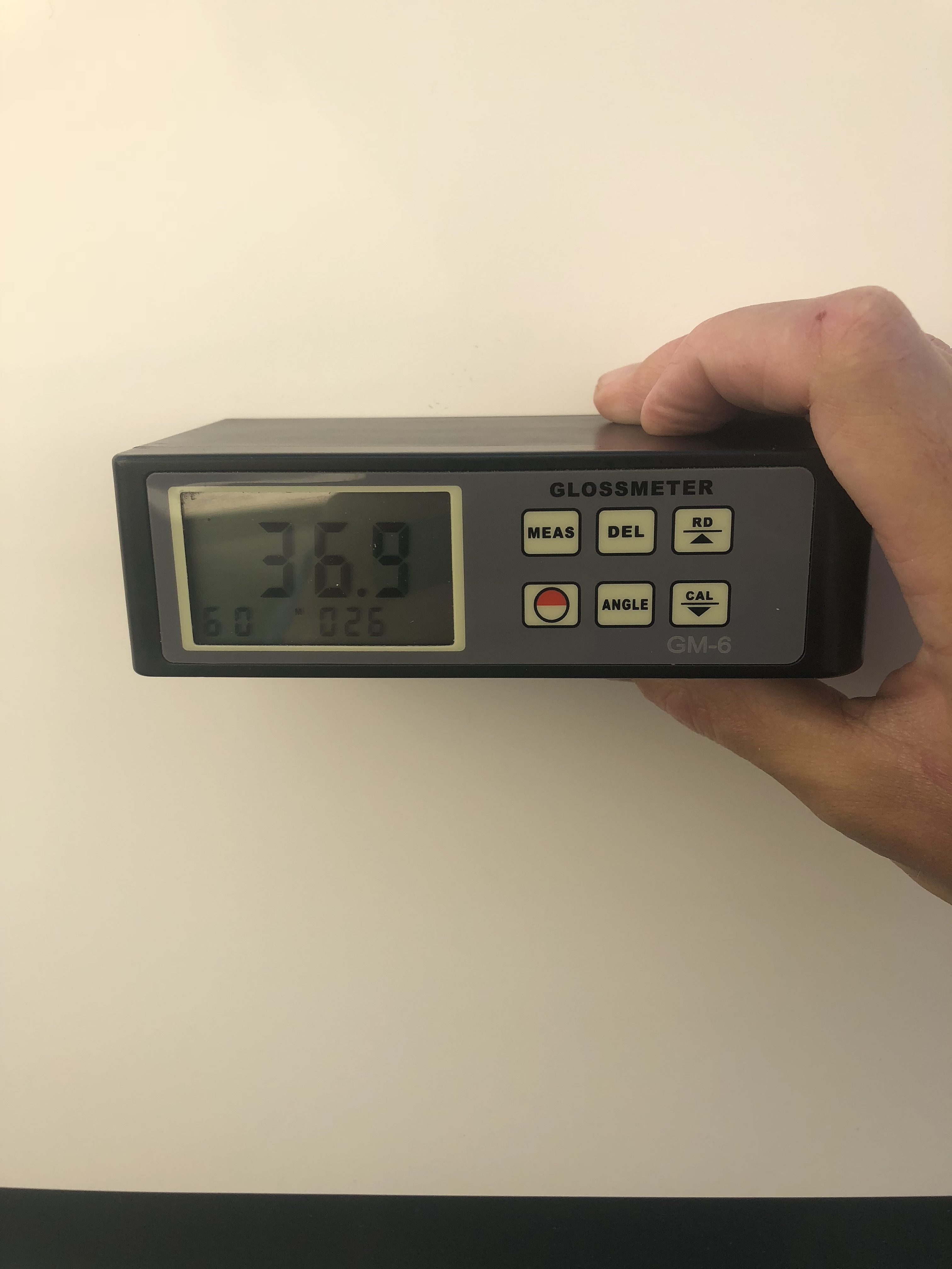 36.9 gloss meter reading on the hull of a Robalo