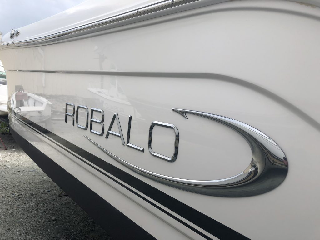 Reflection from white hulled Robalo after applying Glidecoat the best ceramic coating for boats