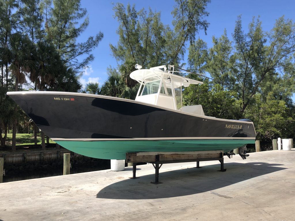 Port Side of 32' Regulator after Glidecoat ceramic coating application in boat yard