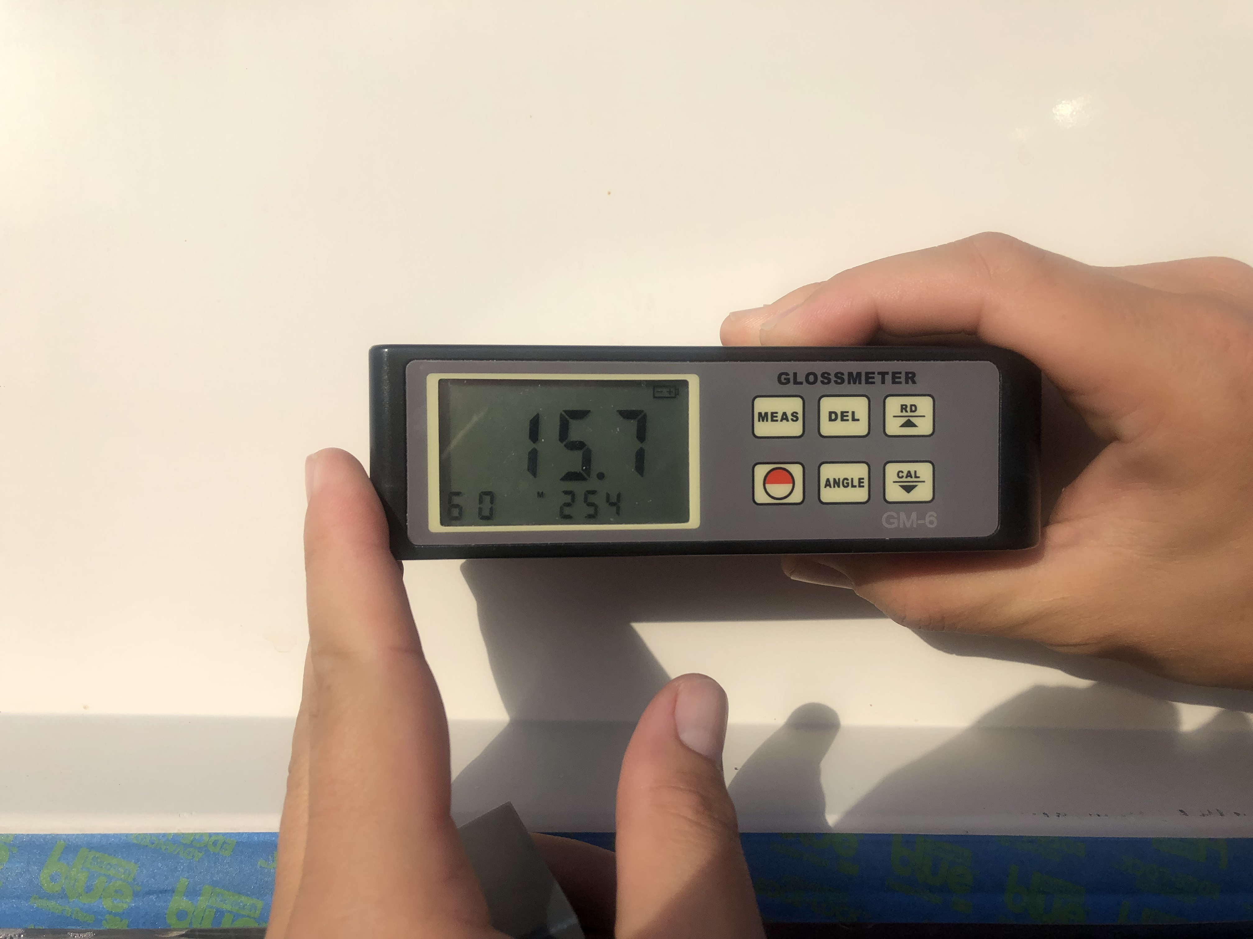 Gloss meter reading of 15.7 on the hull of a sportfisherman