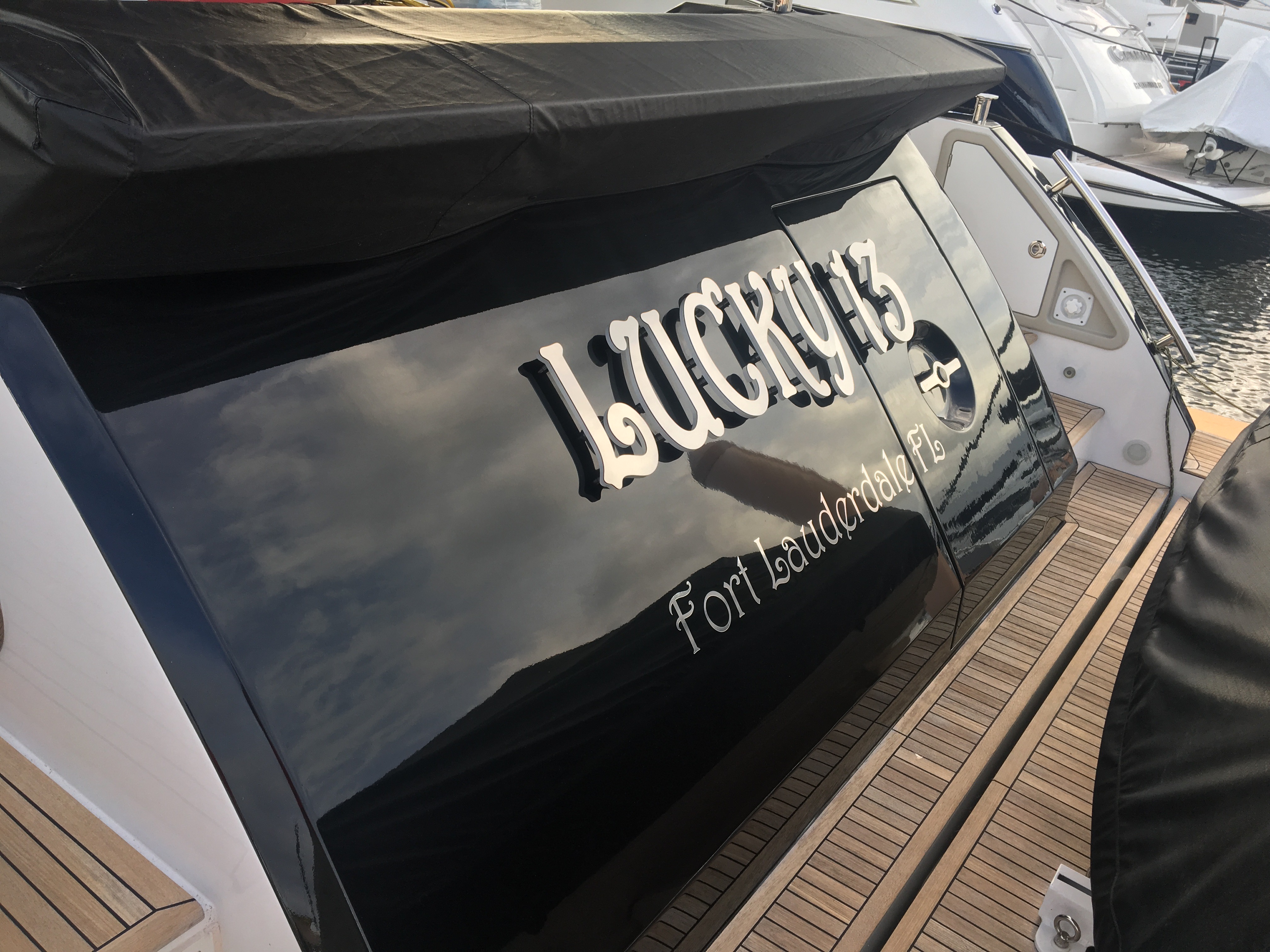 Transom of 66' Azimut with Lucky 13