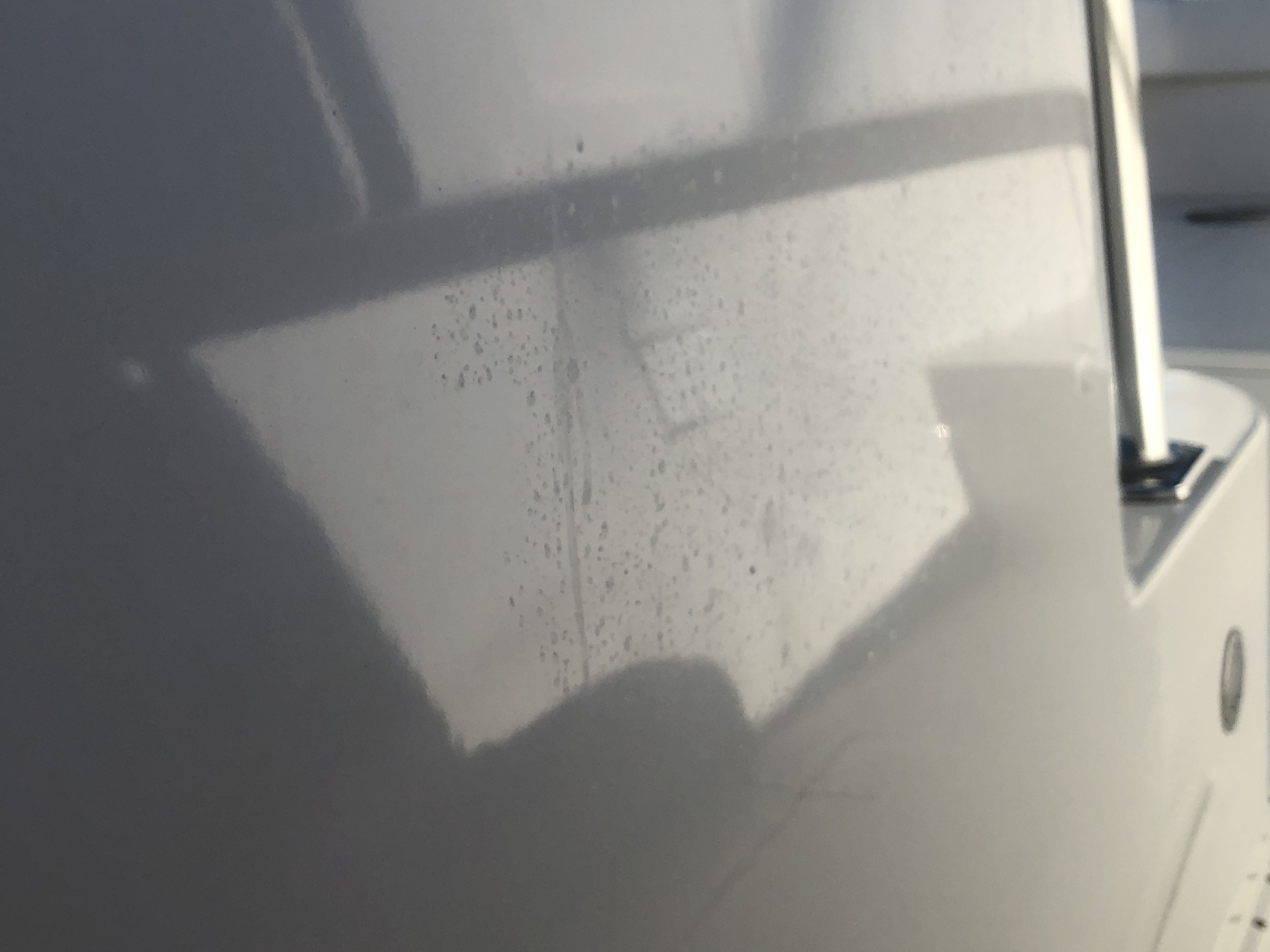 Water stains on the fiberglass of the top side of 34' Venture