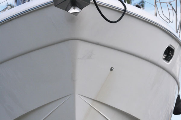 The bow of 1998 52' Princess with yellow stains on the white hull